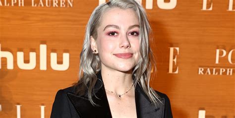 Phoebe Bridgers poses semi